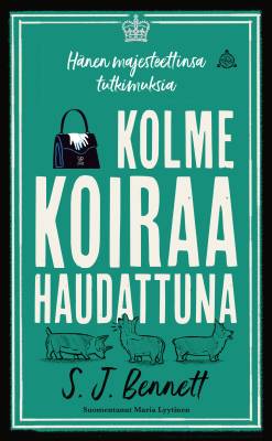 Kolme koiraa haudattuna